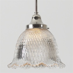 A rare spiral prismatic holophane light fixture. An antique industrial light that proves beautiful for any modern home.