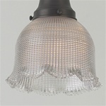 A beautiful rounded bell prismatic shade with scalloped edges. A vintage original.